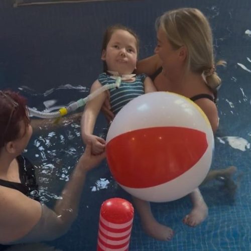Derian House makes waves as first ventilated child takes a dip since COVID